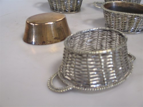 Lot 359 - A set of four silverplated novelty salts in...