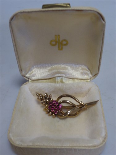 Lot 276 - A ruby and diamond flower brooch