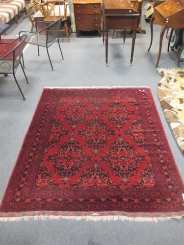 Lot 743 - A large red Bilicik rug, 190 x 154cm