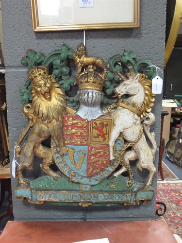 Lot 99 - An early 20th century painted plaster Royal...
