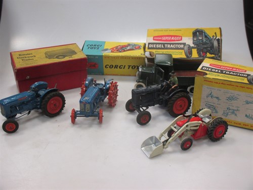 Lot 180 - Britains model farm tractors, two in damaged...