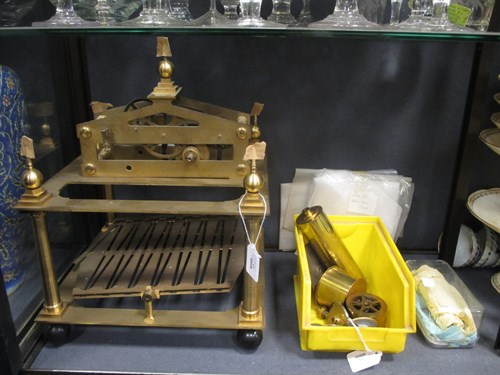 Lot 63 - A brass rolling ball clock, dissassembled and...