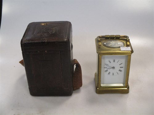 Lot 138 - A brass cased carriage clock with case and key