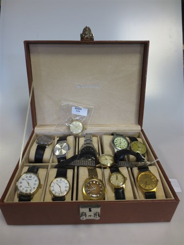 Lot 320 - A cased collection of 12 watches including a...