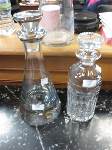 Lot 261 - A silver mounted decanter and another modern...
