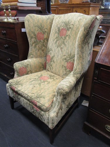 Lot 608 - A George III style wingback armchair
