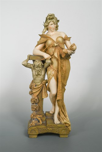 Lot 31 - Ernst Wahliss (Austrian 1837-1900), an Art Nouveau pottery figure of a pretty young woman