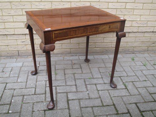 Lot 347 - A Queen Anne style walnut side table, with a...