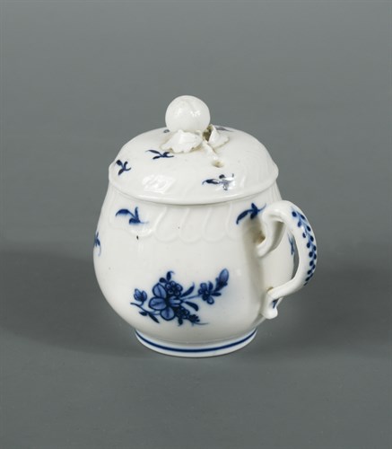 Lot 262 - A Tournai blue and white baluster custard cup...