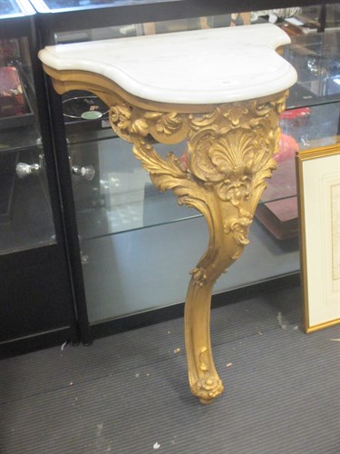 Lot 355 - A small giltwood monopodia console table with...