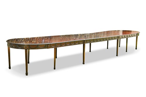 Lot 574 - A 20th century Adam style mahogany D end dining table