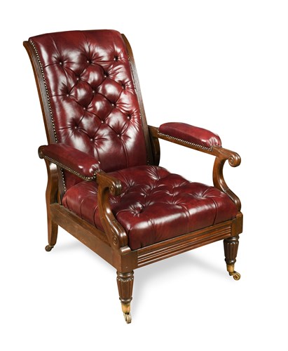 Lot 518 - A William IV mahogany library armchair, button...