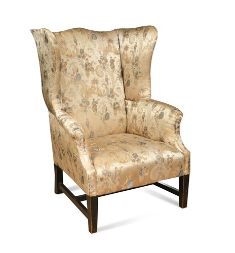 Lot 541 - A 19th century wing armchair, upholstered in a...