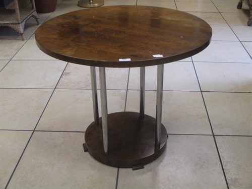 Lot 362 - An Art Deco walnut circular two tier...