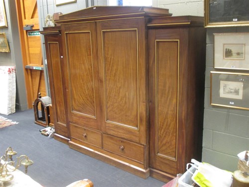 Lot 429 - A mid 19th century mahogany and parcel gilt gentleman's wardrobe