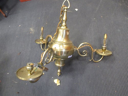 Lot 434 - A brass three branch chandelier
