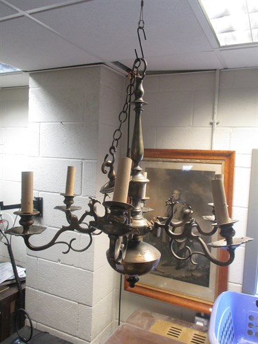 Lot 435 - An Eastern six branch brass chandelier