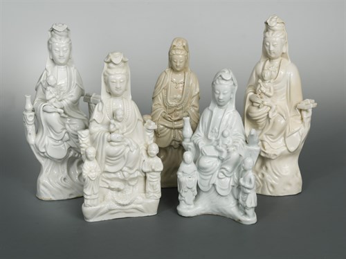 Lot 86 - A group of five Chinese Dehua Guanyin figure groups, Qing Dynasty