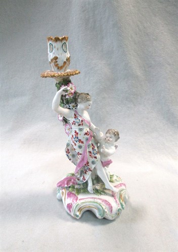 Lot 23 - A Derby Patch Mark figural candlestick of 'Venus with Cupid', circa 1770