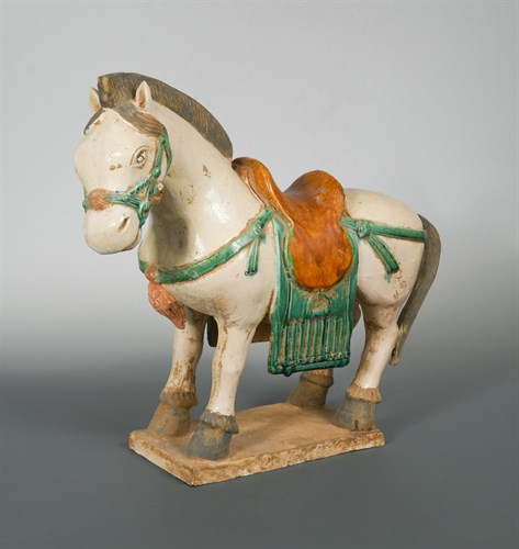 Lot 92 - A large Ming Dynasty Sancai glazed horse