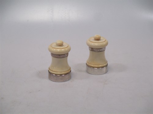 Lot 94 - A pair of 20th century silver mounted ivory...