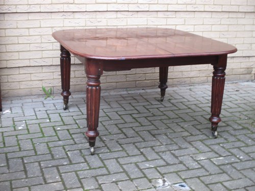 Lot 628 - A 19th Century mahogany extending dining table