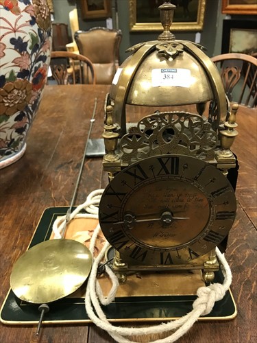 Lot 131 - A 17th century style brass lantern clock