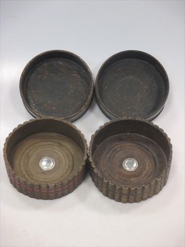 Lot 46 - A pair of Georgian leather wine coasters