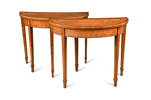 Lot 512 - A pair of late George III satinwood card tables