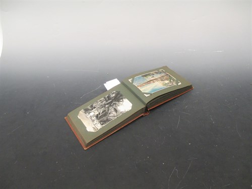 Lot 366 - Singapore & Penang interest, an album of approximately 59 real and printed photographic postcards