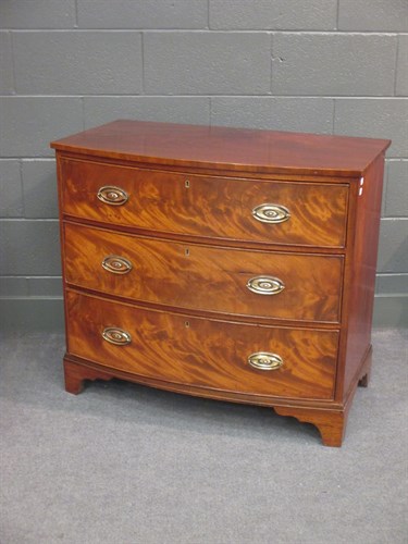 Lot 637 - An early 19th century mahogany bow fronted...