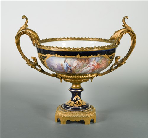 Lot 1 - A late 19th century porcelain and gilt metal mounted two-handled pedestal bowl