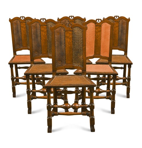 Lot 640 - A set of six early 18th century walnut chairs