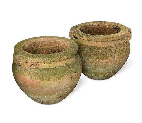 Lot 587 - A set of four modern composite stone garden urns in the manner of Gertrude Jekyll