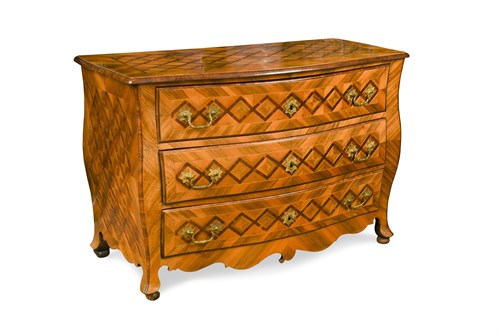Lot 557 - An 18th century German kingwood bombe commode