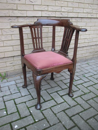 Lot 598 - A George III mahogany corner armchair