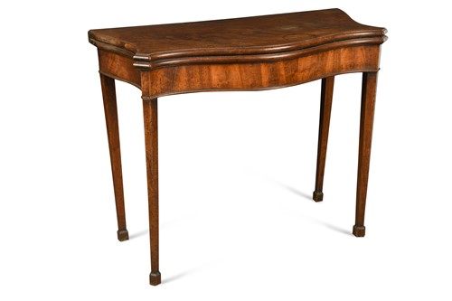Lot 634 - A George III mahogany serpentine card table