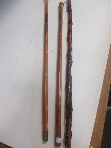 Lot 176 - A Japanese bamboo walking cane, carved with...