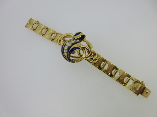 Lot 101A - A French antique diamond, enamel and 18ct gold bracelet