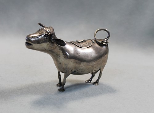Lot 315 - A Dutch metalwares silver Schuppe style cow creamer