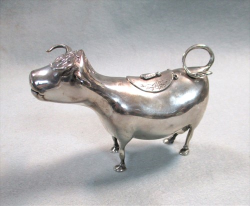 Lot 421 - A (probably) Dutch metalwares Schuppe style cow creamer