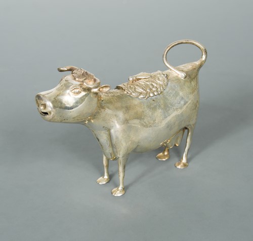 Lot 422 - A continental metalwares Schuppe style cow creamer