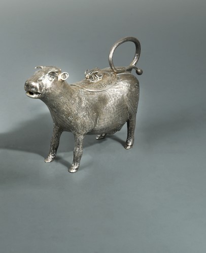 Lot 423 - An unusual (probably) continental metalwares cast cow creamer