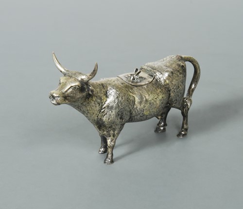 Lot 424 - A continental metalwares semi naturalistic cow creamer