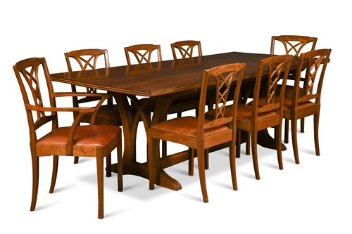 Lot 228 - Edward Barnsley, an Australian black bean refectory dining table and twelve chairs, circa 1958