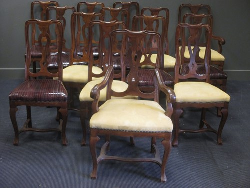 Lot 305 - A set of 14 dining chairs including two...