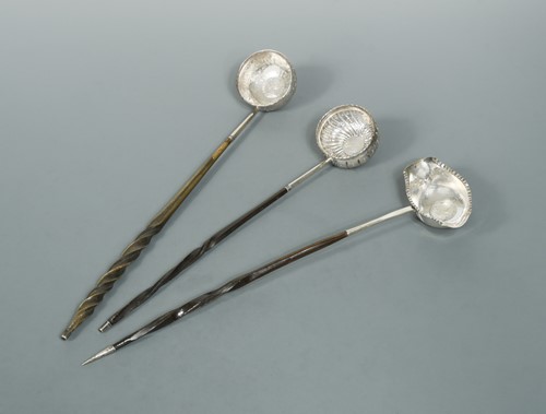 Lot 431 - Three punch ladles each set with a Queen Anne coin