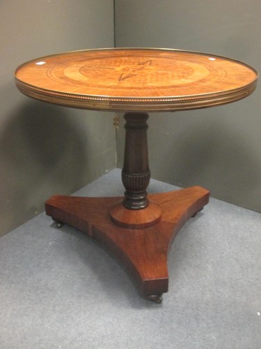 Lot 296 - A rosewood and inlaid circular tilt top table,...