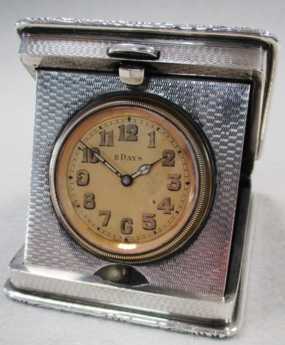 Lot 389 - A George V silver travelling timepiece