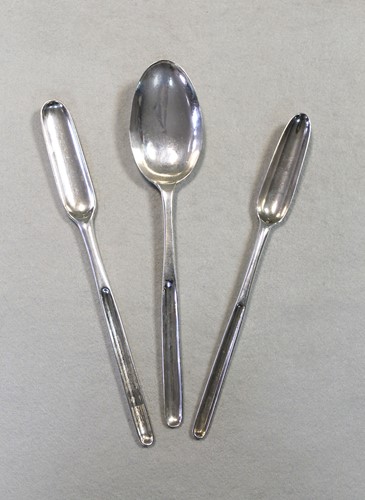 Lot 442 - A George II silver marrow scoop together with two George III examples